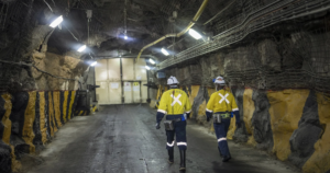 Workers at Mali gold refinery under construction; gold bullion bars from Uganda refinery
